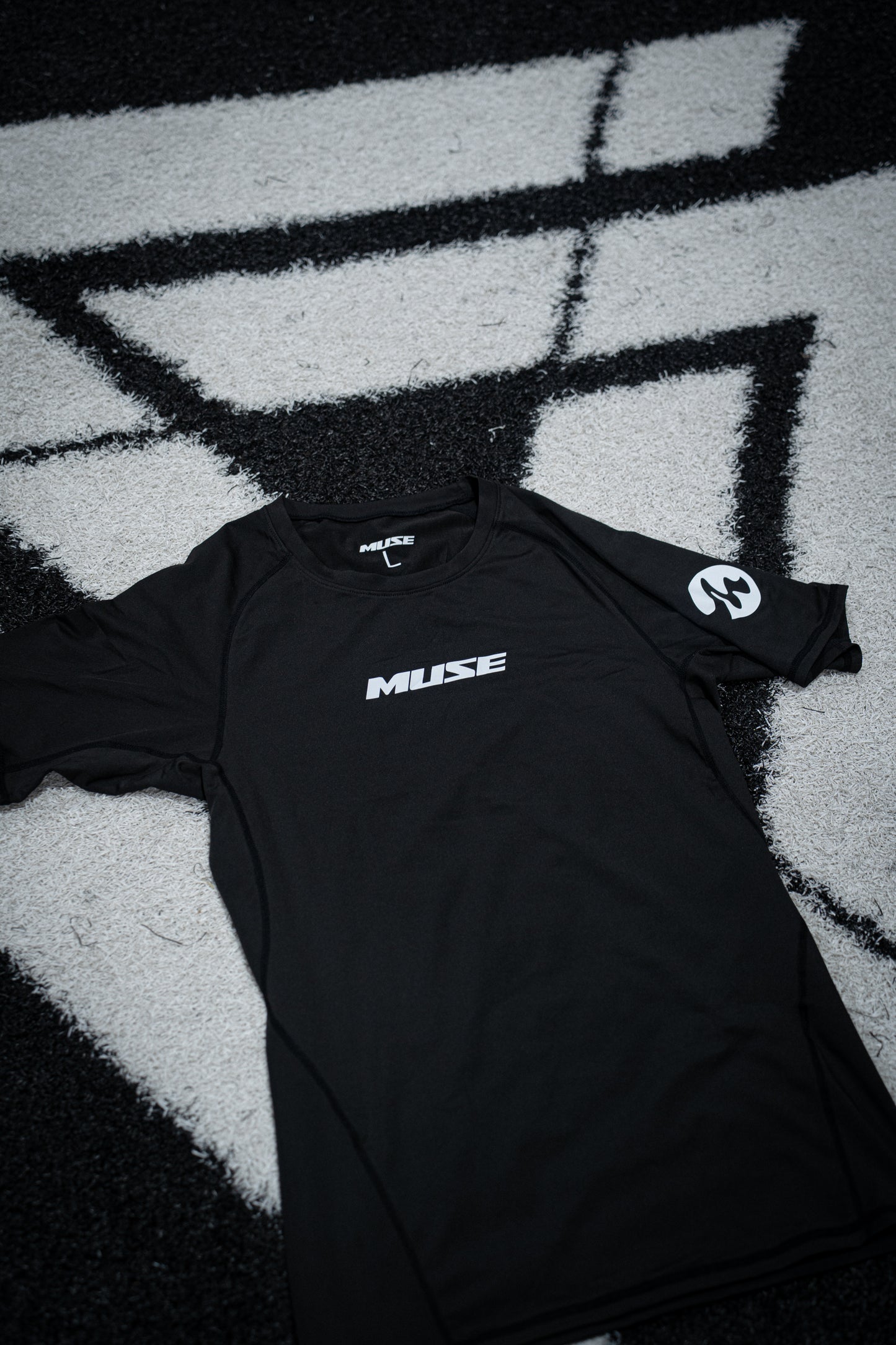 MUSE COMPRESSION SIDE LOGO