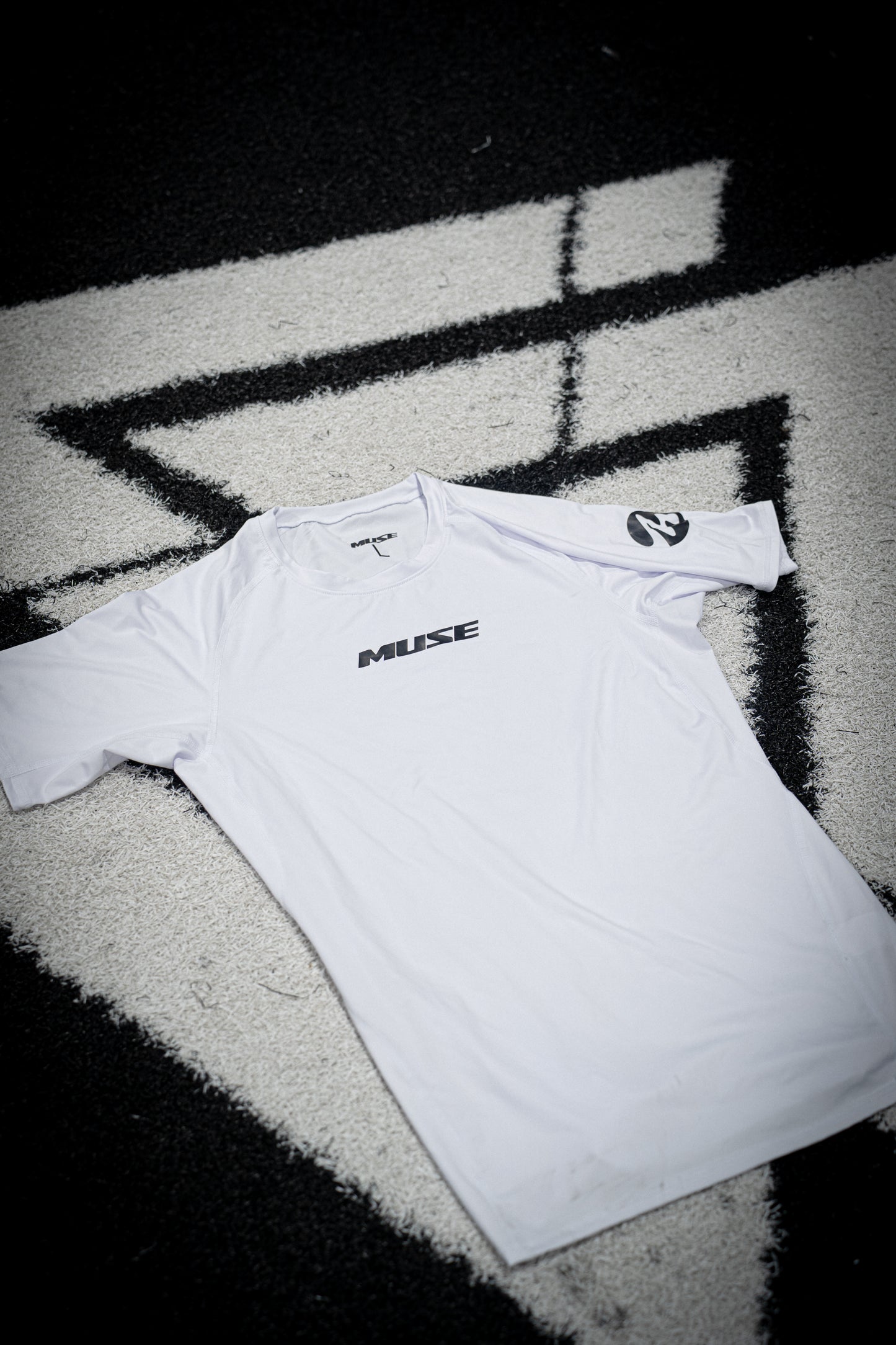 MUSE COMPRESSION SIDE LOGO